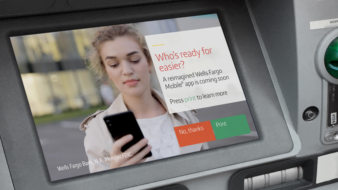 Close up of ATM screen featuring an ad for Wells Fargo mobile app